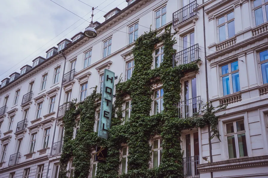 Ivy-covered facade of a boutique hotel