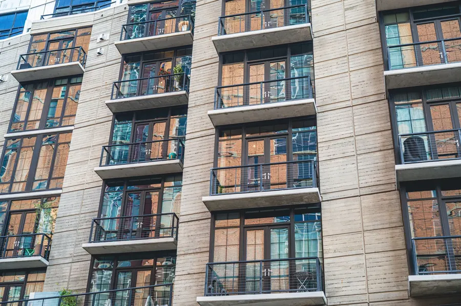 Facade of a multi-storey residential building with balconies